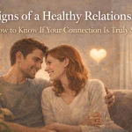 Signs of a healthy relationship illustrated by a happy couple showing trust, emotional connection, and mutual support in a warm home environment.